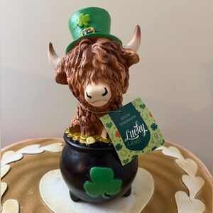 Lucky Lane St Patrick’s Day Resin Highland Cow with Shamrock Hat in Pot of Gold